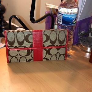Red and brown Coach wallet